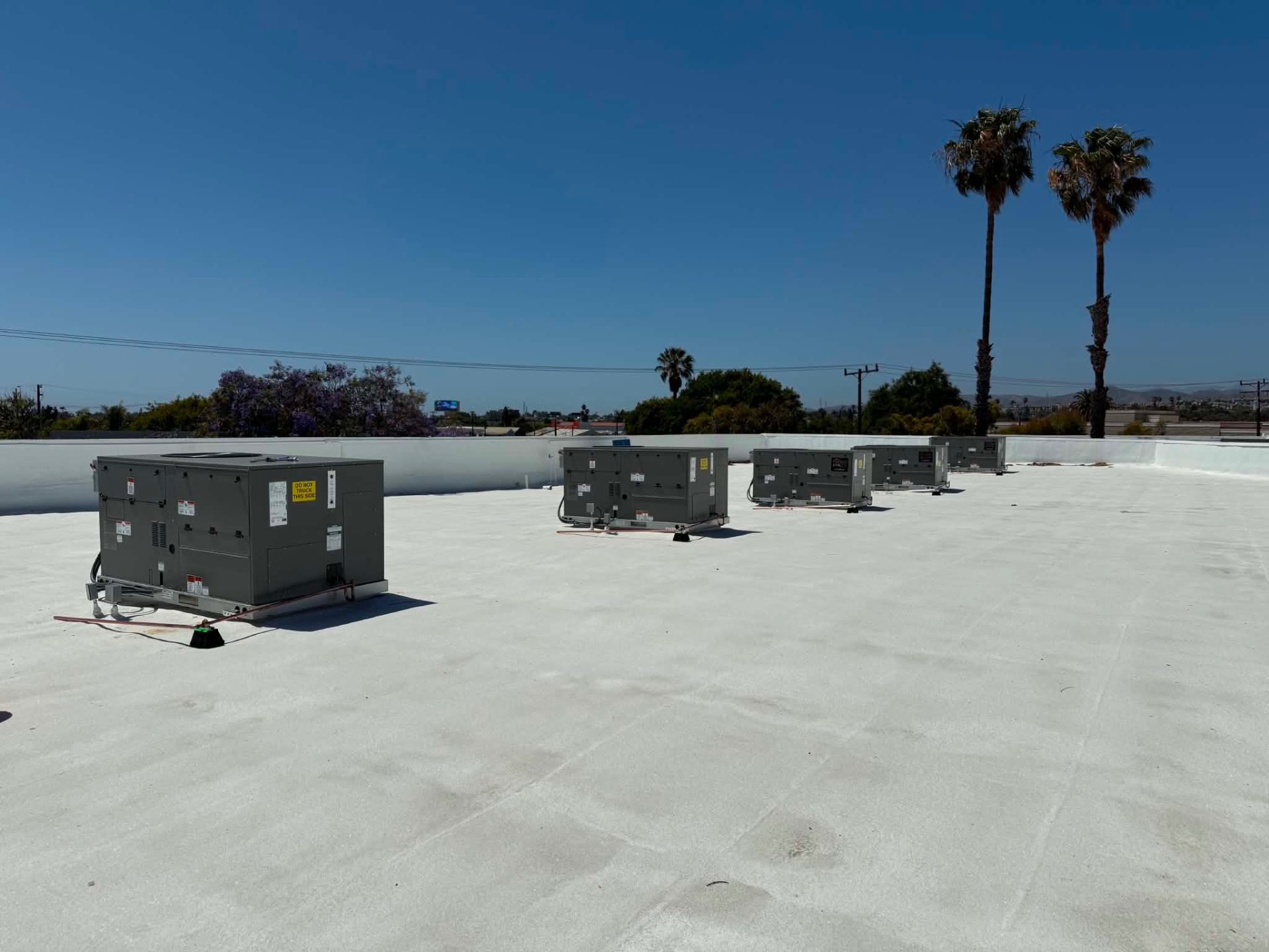ColdTech HVAC technician servicing an air conditioning unit